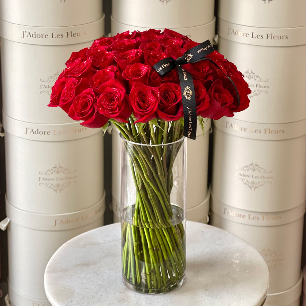 Roses and Stems in a Glass Vase - JLF Miami Florist